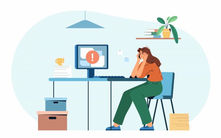 Eine gestresste Frau sitzt an einem Schreibtisch mit einem Computer, der eine Fehlermeldung anzeigt, umgeben von Unterlagen und Pflanzen.